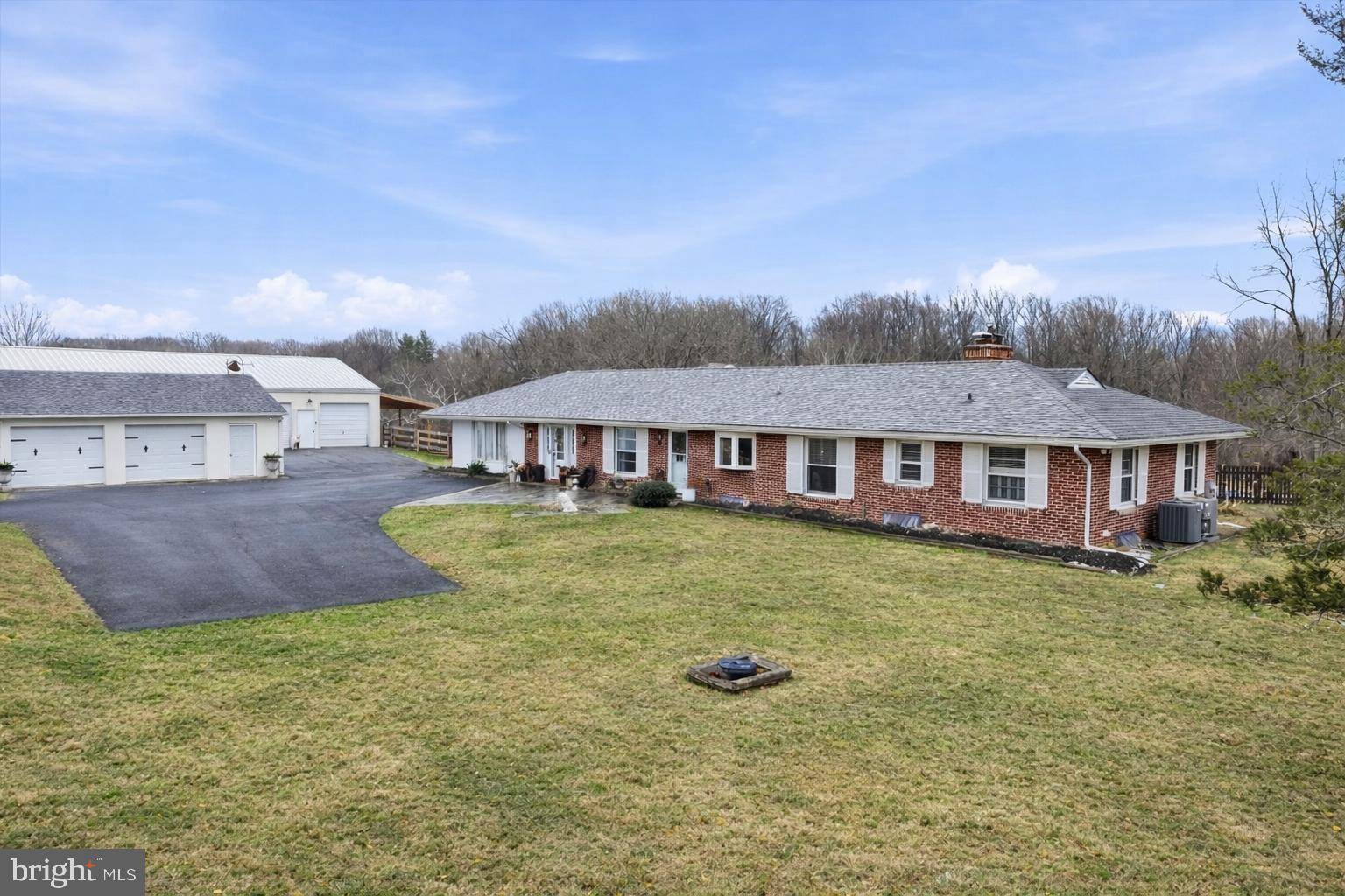 875 Locust Grove Road West Chester, PA 19382 - Photo 2 of 44 an aerial view of a house with garden