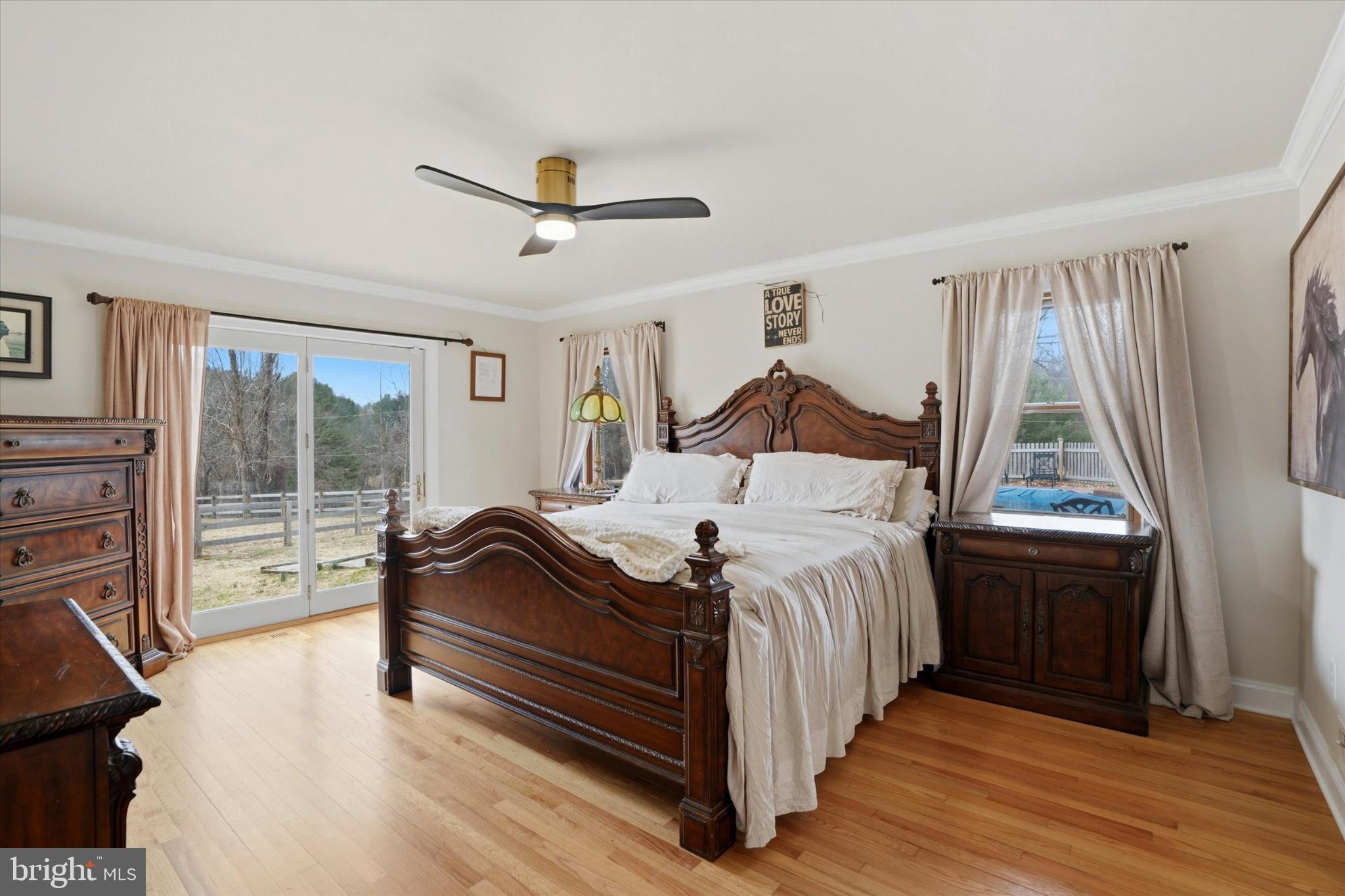 875 Locust Grove Road West Chester, PA 19382 - Photo 21 of 44 a bedroom with a bed and wooden floor