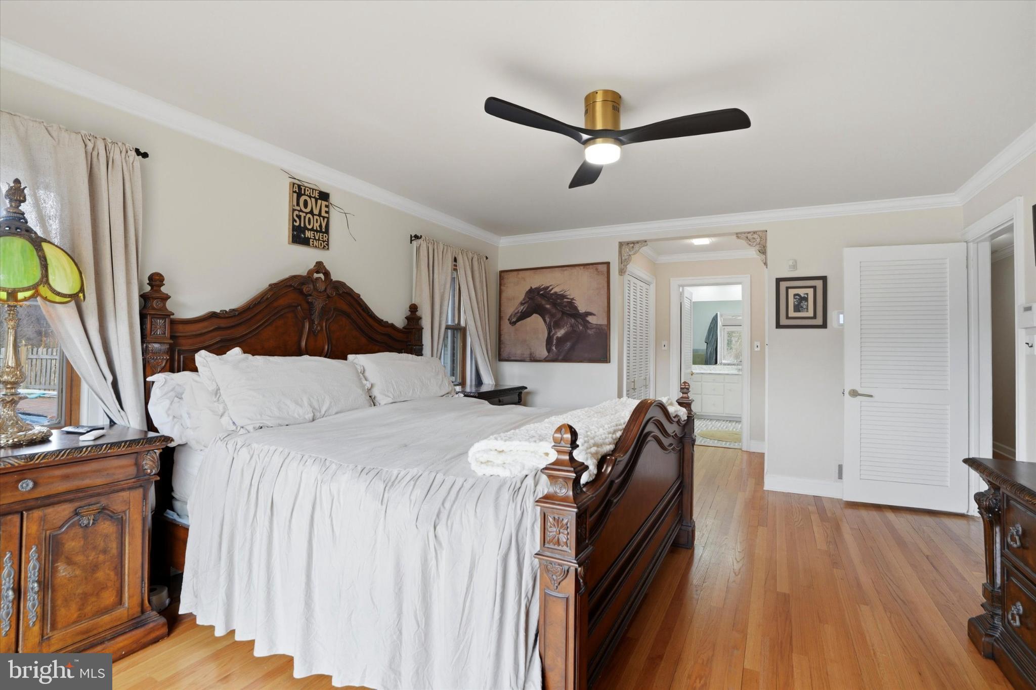 875 Locust Grove Road West Chester, PA 19382 - Photo 22 of 44 a bed room with a bed and a ceiling fan