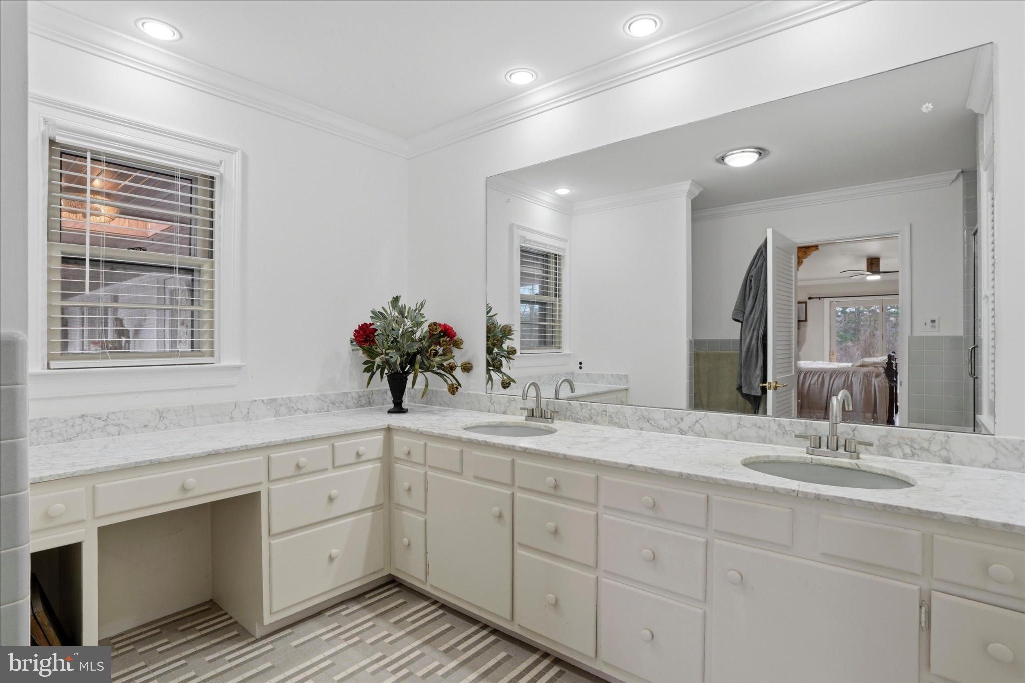 875 Locust Grove Road West Chester, PA 19382 - Photo 24 of 44 a bathroom with a sink double vanity granite and a mirror