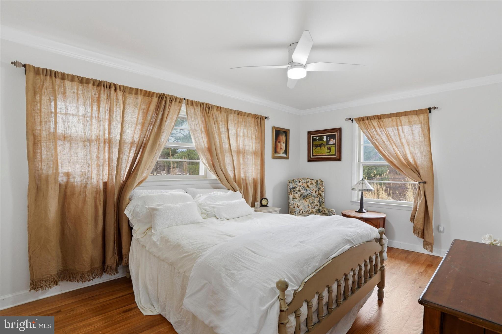 875 Locust Grove Road West Chester, PA 19382 - Photo 25 of 44 a bedroom with a large bed and a window