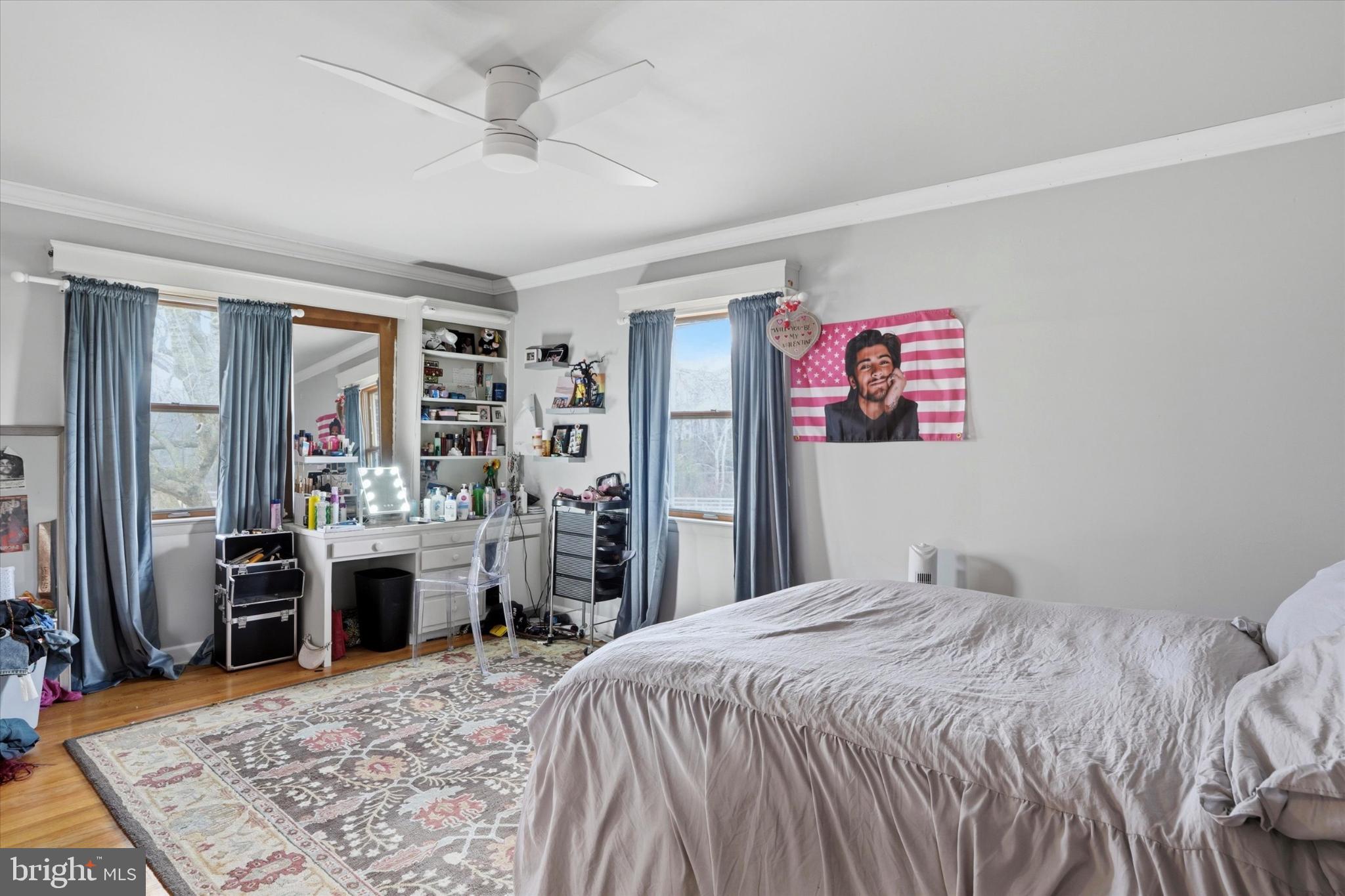 875 Locust Grove Road West Chester, PA 19382 - Photo 28 of 44 a bedroom with a bed dresser and a large mirror