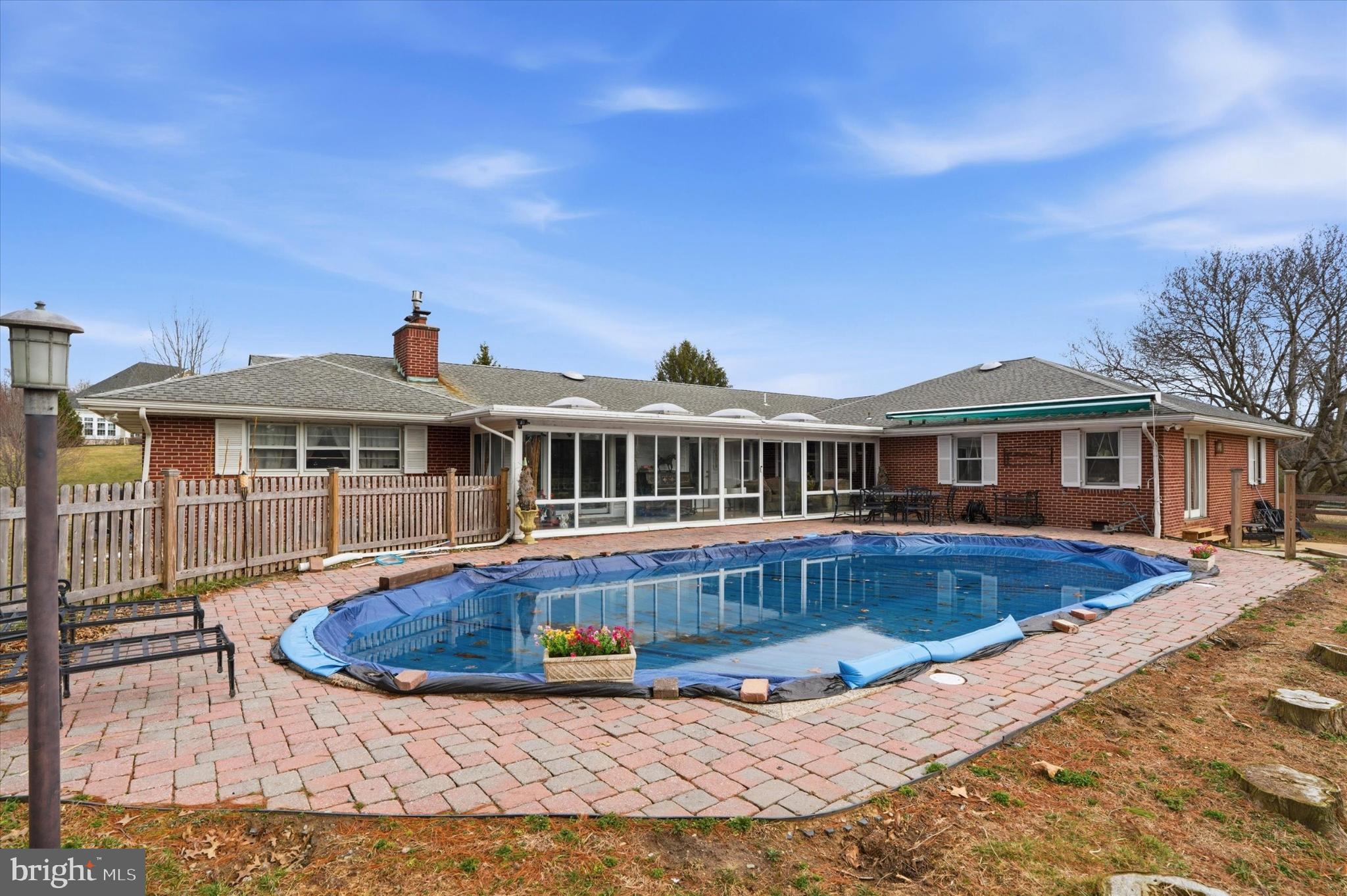 875 Locust Grove Road West Chester, PA 19382 - Photo 32 of 44 a front view of a house with yard and balcony