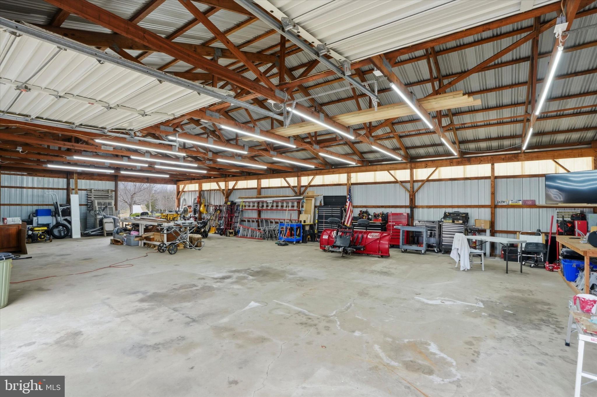 875 Locust Grove Road West Chester, PA 19382 - Photo 35 of 44 a view of a garage with storage and a utility room