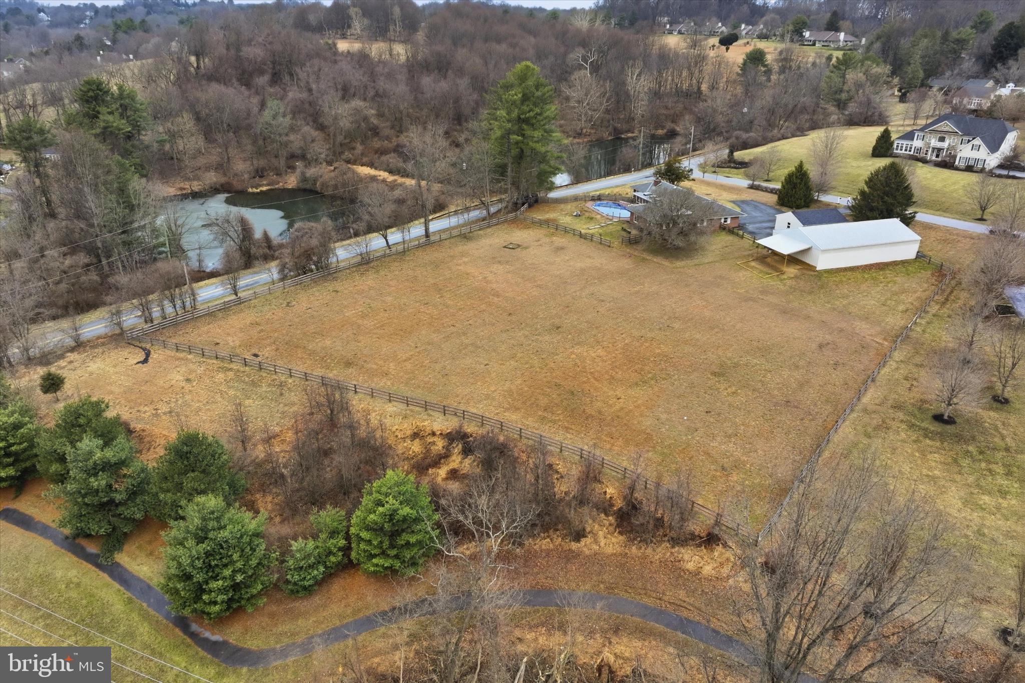 875 Locust Grove Road West Chester, PA 19382 - Photo 43 of 44 a view of a swimming pool with a yard