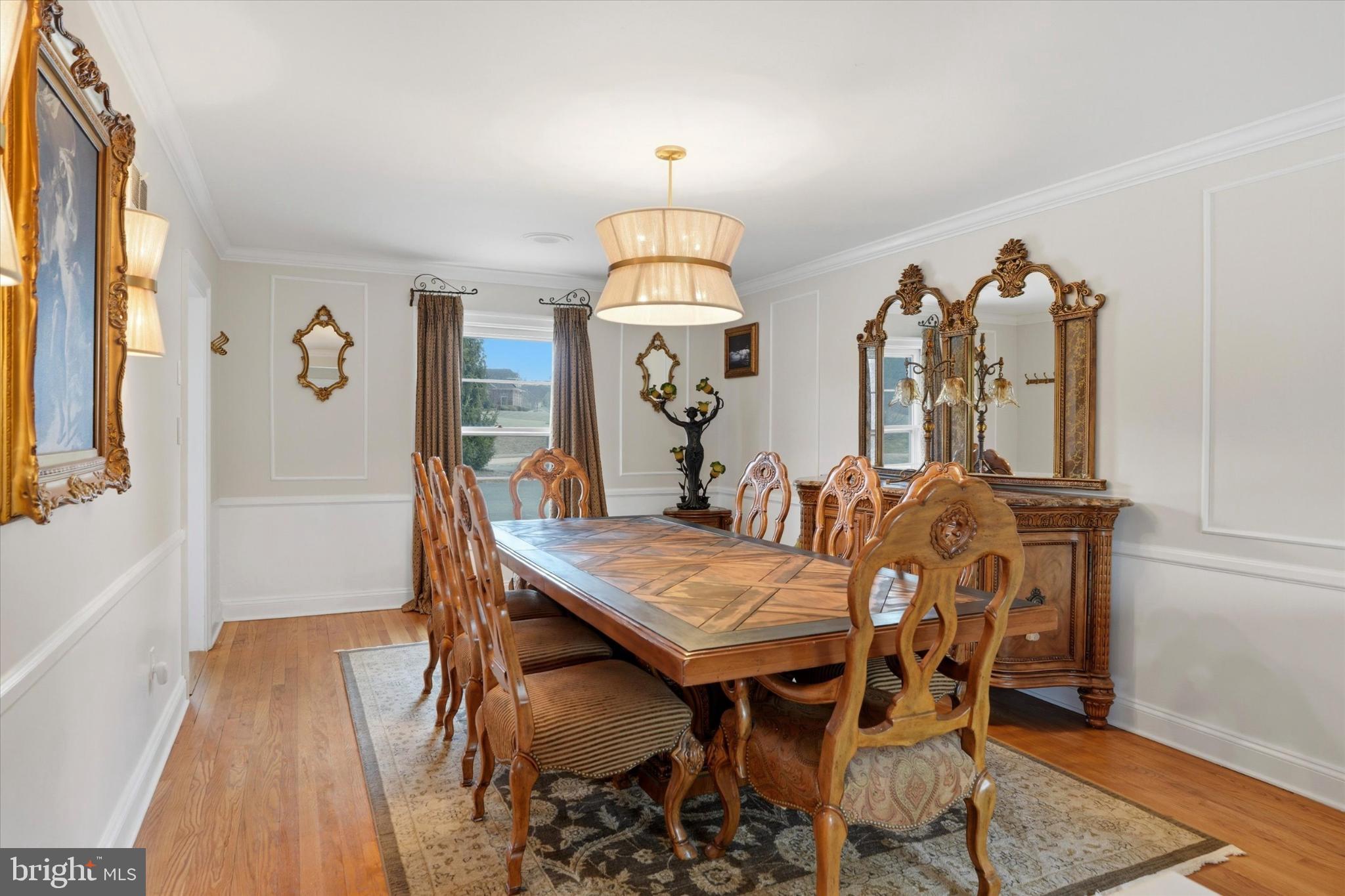 875 Locust Grove Road West Chester, PA 19382 - Photo 8 of 44 a view of a dining room with furniture and wooden floor