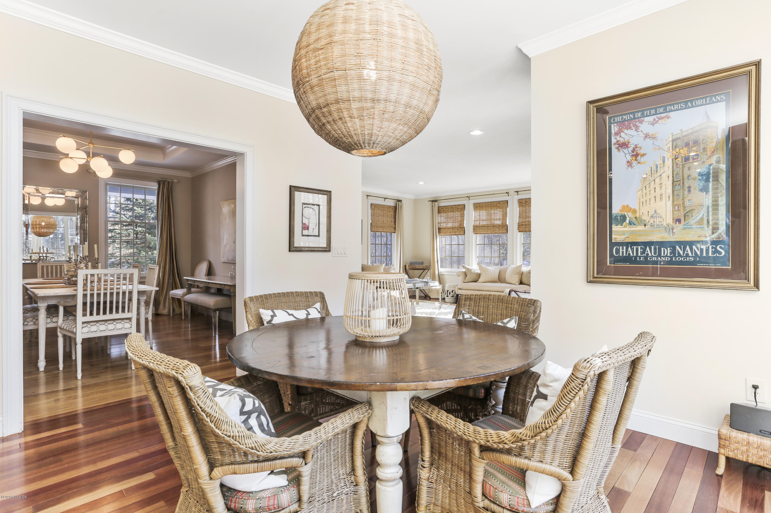 184 Cat Rock Road Cos Cob, CT 06807 - Photo 12 of 25 a view of a dining room with furniture window and wooden floor