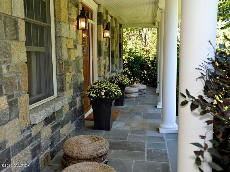 184 Cat Rock Road Cos Cob, CT 06807 - Photo 4 of 25 a view of a balcony with potted plants