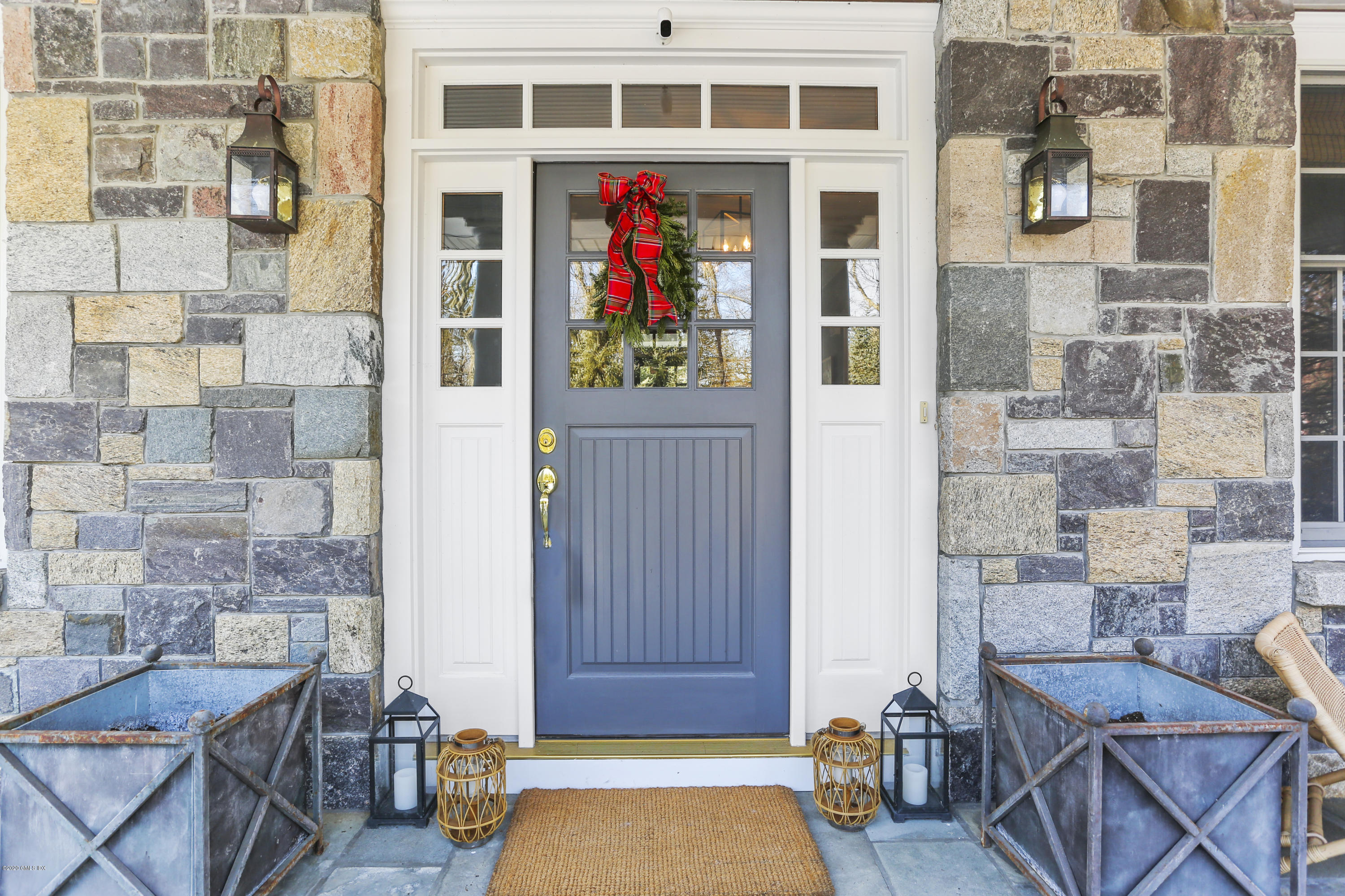 184 Cat Rock Road Cos Cob, CT 06807 - Photo 5 of 25 a view of front door of house and outdoor space