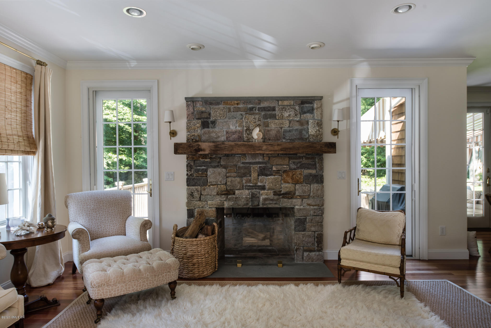 184 Cat Rock Road Cos Cob, CT 06807 - Photo 8 of 25 a living room with furniture and a fireplace