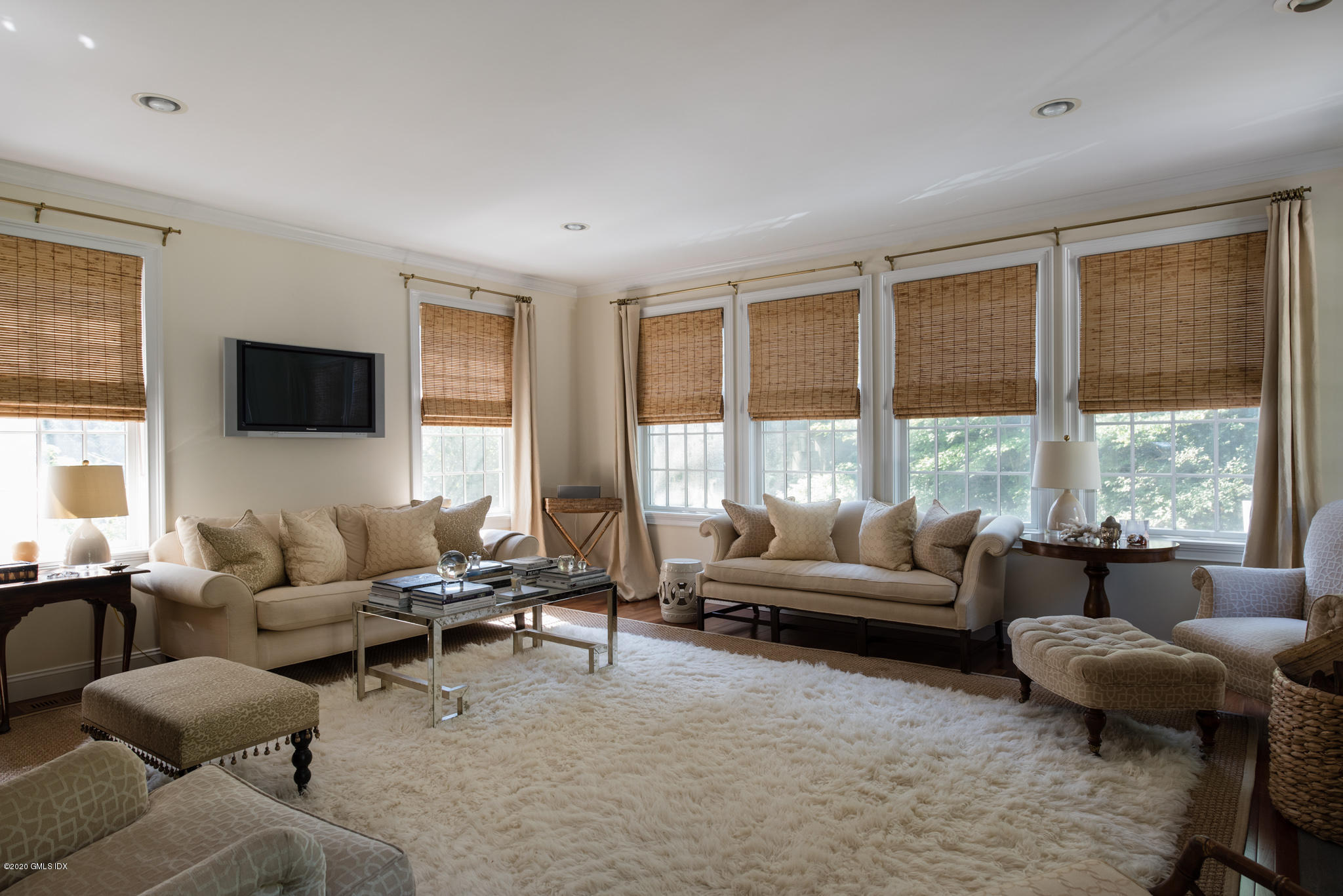 184 Cat Rock Road Cos Cob, CT 06807 - Photo 9 of 25 a living room with furniture and a large window