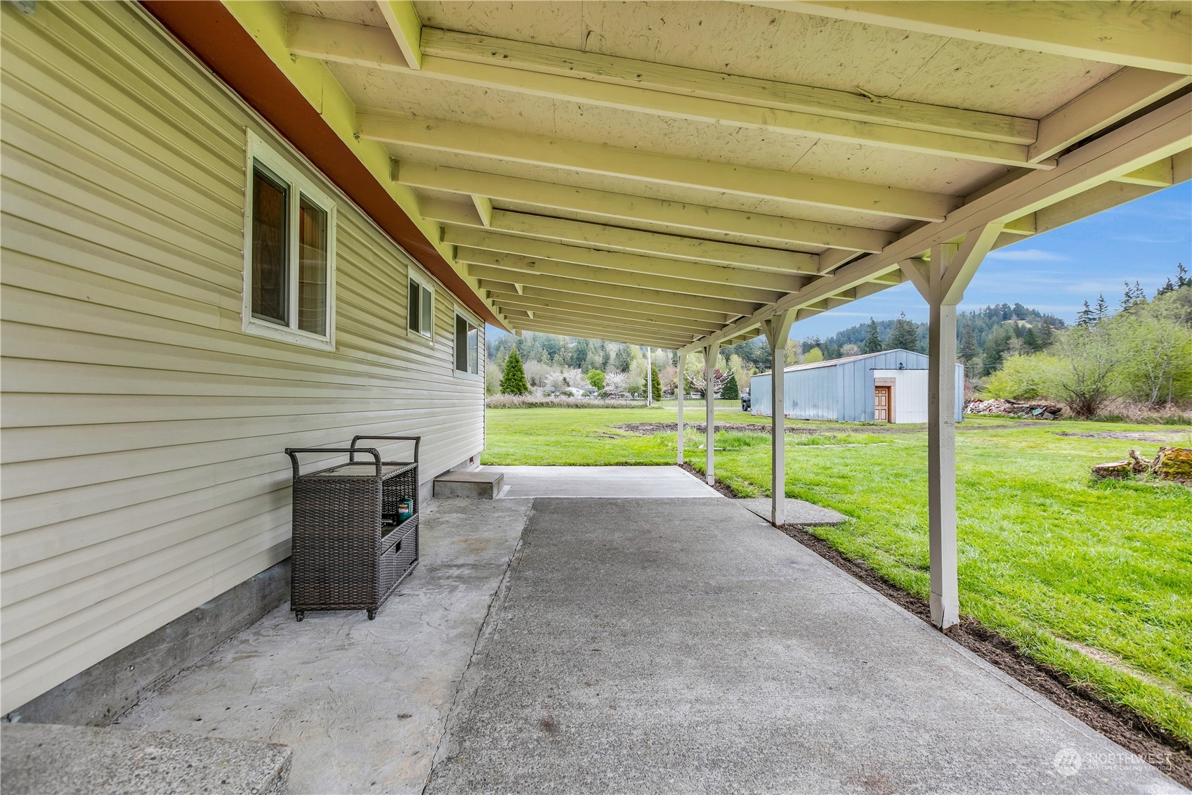 2093 Ryan Road Buckley, WA 98321 - Photo 19 of 25 a view of a porch with furniture and garden