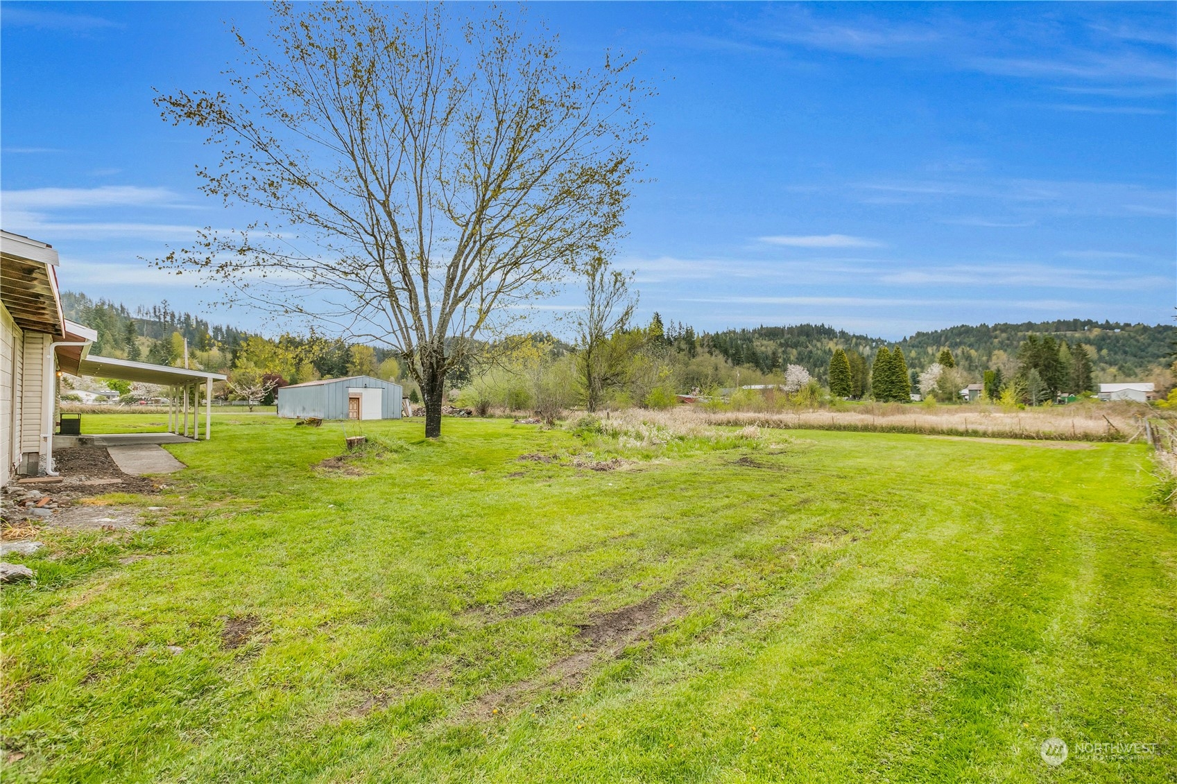 2093 Ryan Road Buckley, WA 98321 - Photo 20 of 25 a view of yard with swimming pool and green space