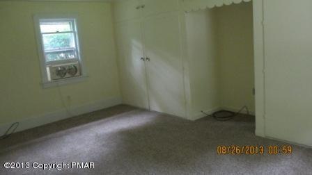 231 Tanite Road Stroudsburg, PA 18360 - Photo 8 of 14 an empty room with windows