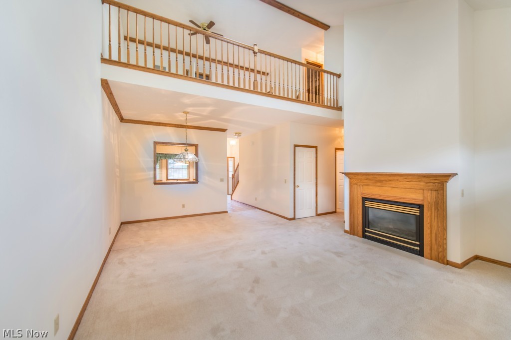 2423 Charing Cross Road Northwest, Unit 79 Canton, OH 44708 - Photo 6 of 25 Great Room, Dining Area, Foyer & Kitchen View