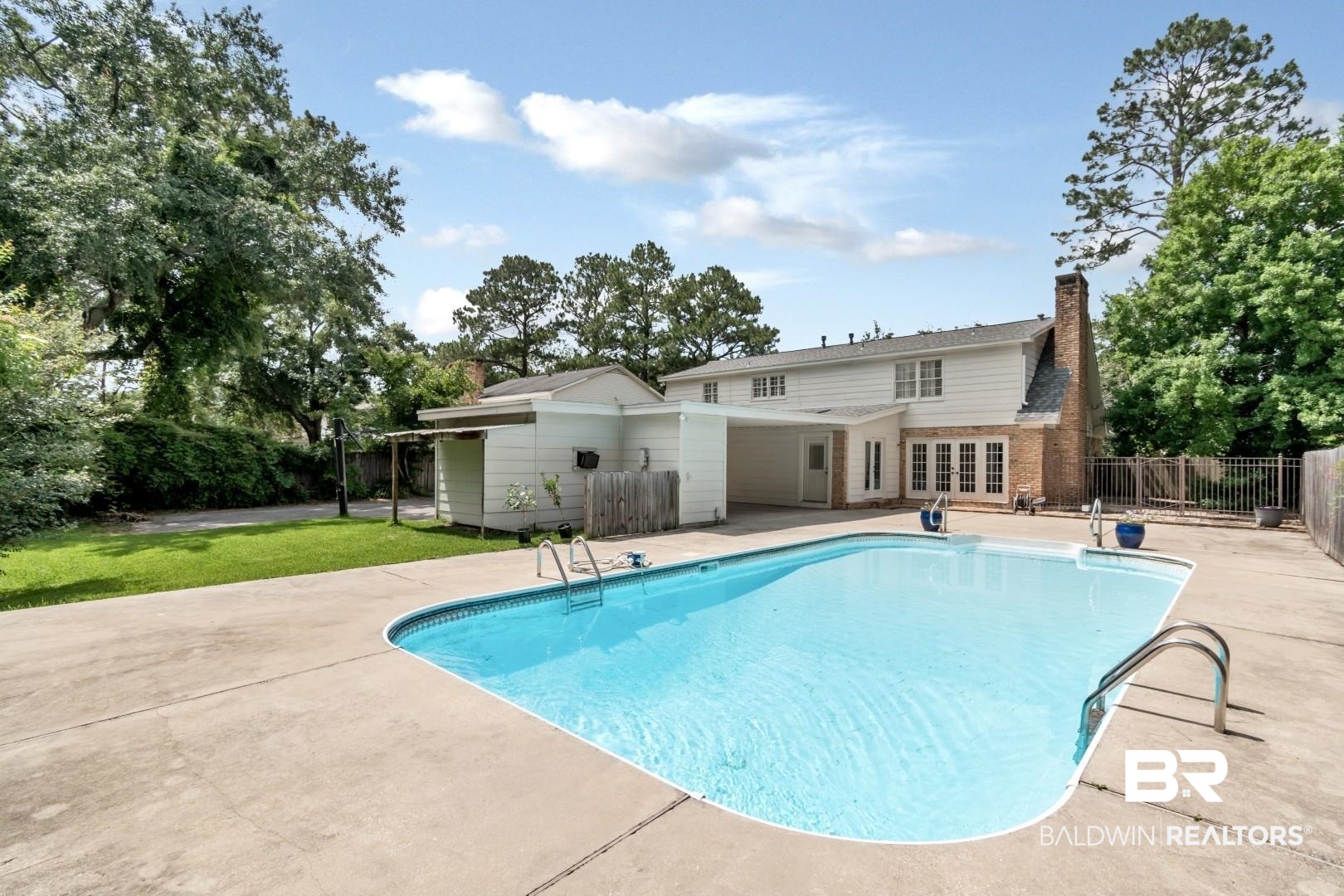 3755 Claridge Road North Mobile, AL 36608 - Photo 2 of 38 View of pool with a patio and french doors