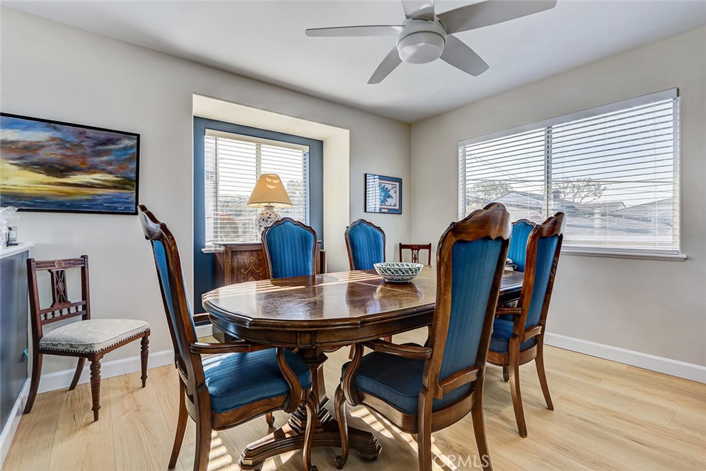 318 Penn Street, Unit 2 El Segundo, CA 90245 - Photo 11 of 28 a view of a dining room with furniture window and wooden floor