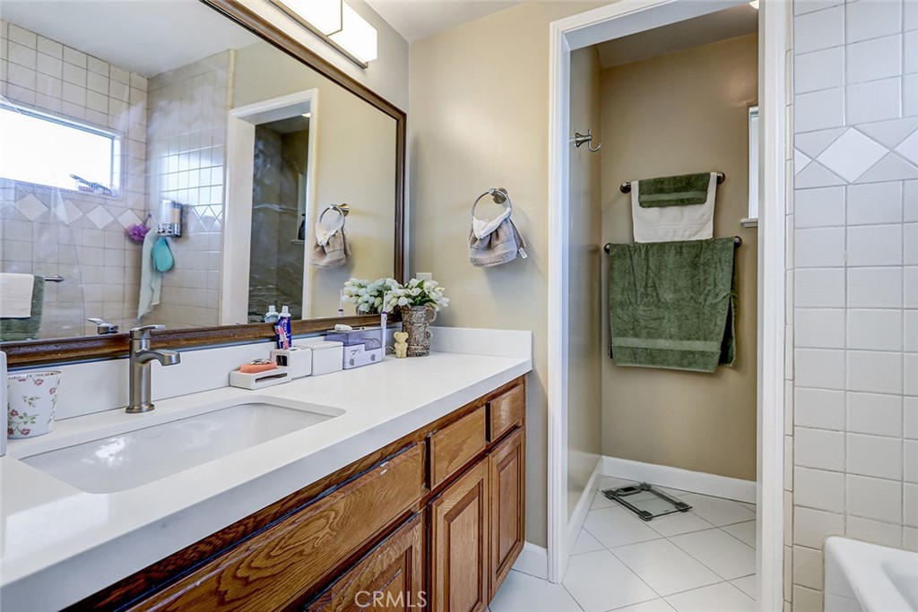 318 Penn Street, Unit 2 El Segundo, CA 90245 - Photo 15 of 28 a bathroom with a sink and mirror