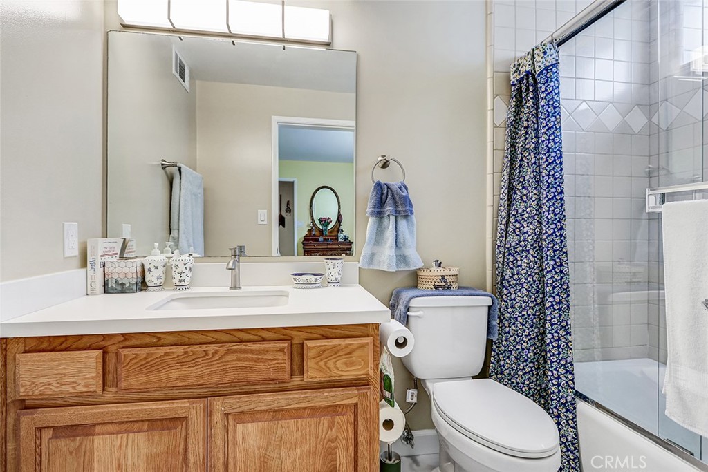 318 Penn Street, Unit 2 El Segundo, CA 90245 - Photo 21 of 28 a bathroom with a sink a toilet a mirror and shower