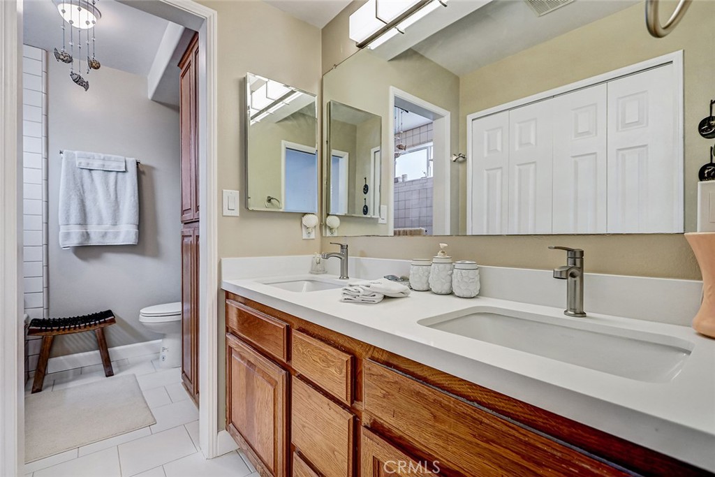 318 Penn Street, Unit 2 El Segundo, CA 90245 - Photo 24 of 28 a bathroom with a sink and a mirror