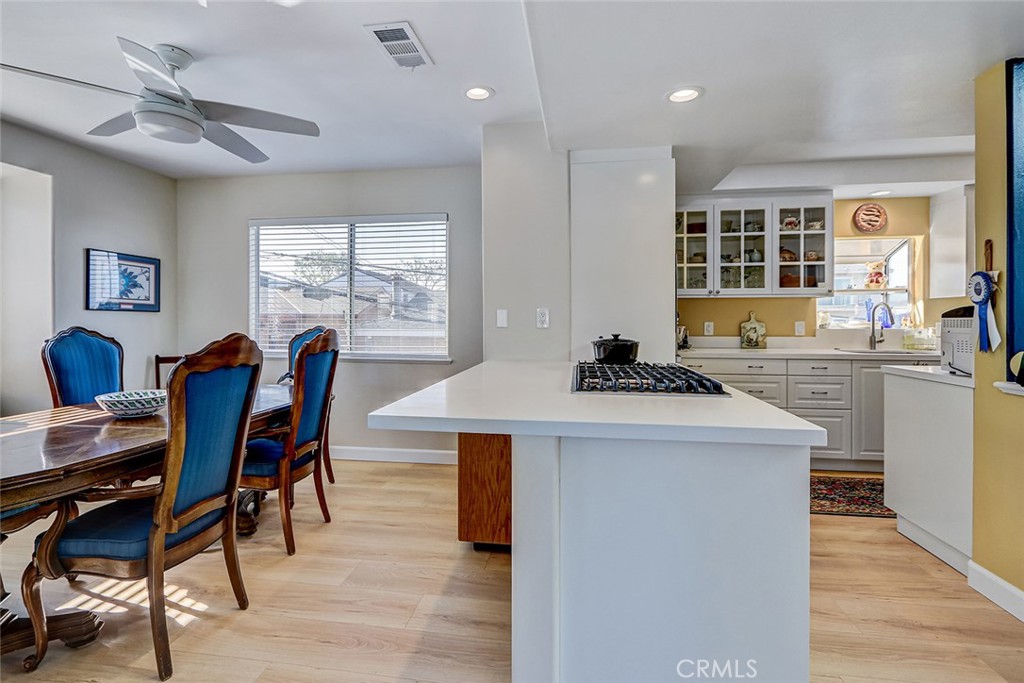 318 Penn Street, Unit 2 El Segundo, CA 90245 - Photo 10 of 28 a view of a dining room with furniture window and wooden floor