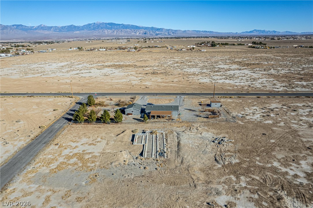 4051 Forest Road Pahrump, NV 89048 - Photo 13 of 15 A desert landscape property awaits your vision, offering mountain views and endless possibilities.