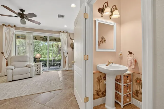 a bathroom with a shower and a sink