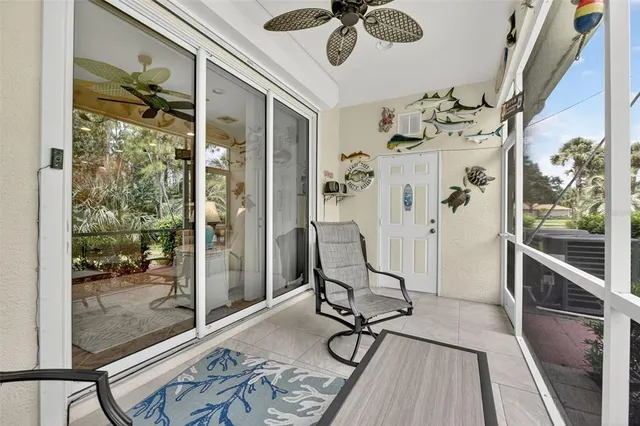 a living room with furniture gym equipment and a window