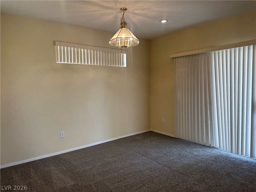 3034 Canal Walk Road Henderson, NV 89052 - Photo 20 of 24 This versatile room offers ample space, perfect for dining or an additional living area.