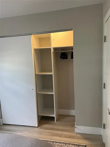 a bathroom with a shower toilet and sink