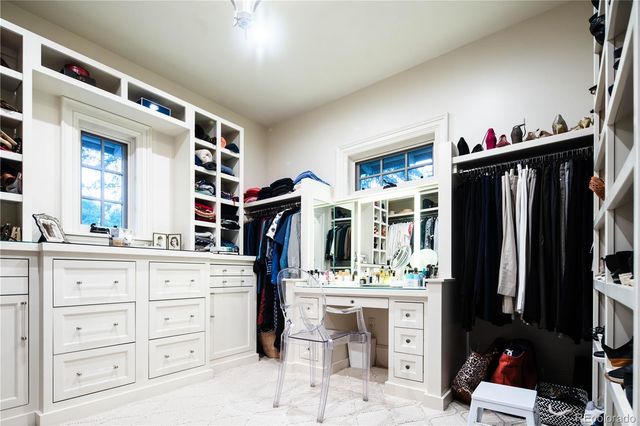 a room with cabinets and a window