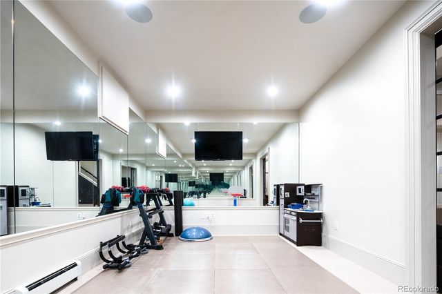 a view of a room with gym equipment