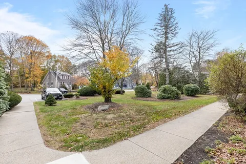 a view of a house with a street