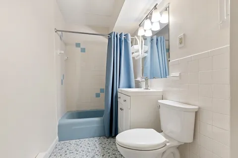 a view of a street with a houses