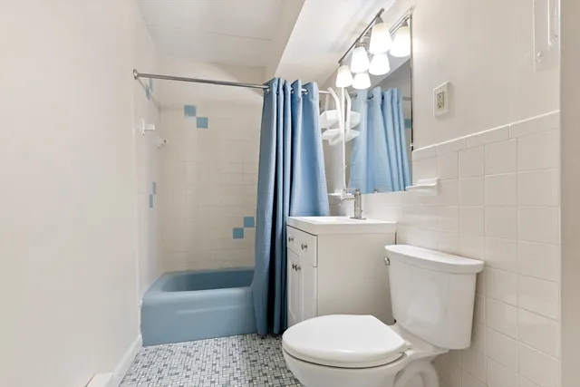 a view of a street with a houses