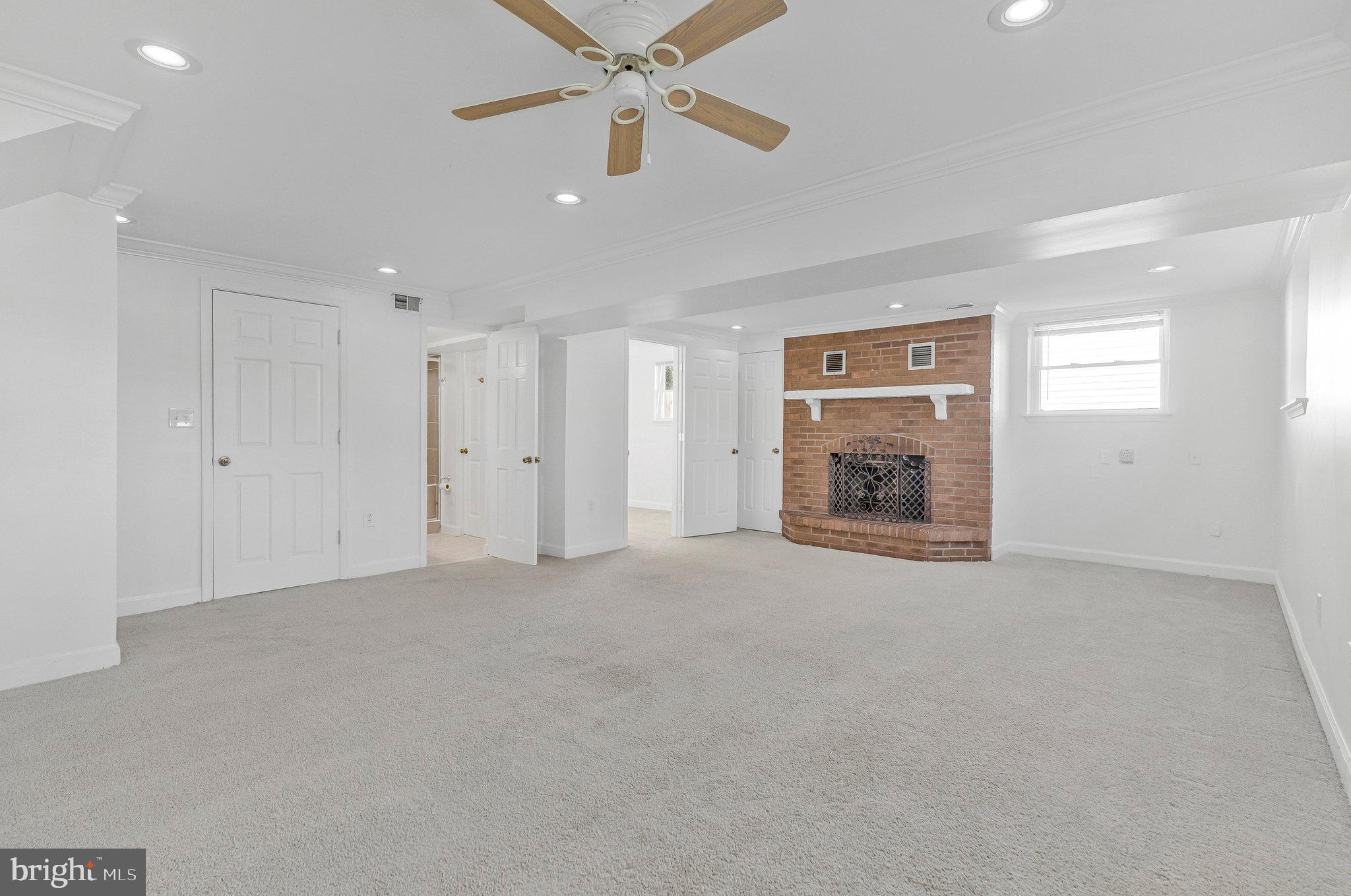 400 East Poplar Road Sterling, VA 20164 - Photo 25 of 40 Lower Level Living Area