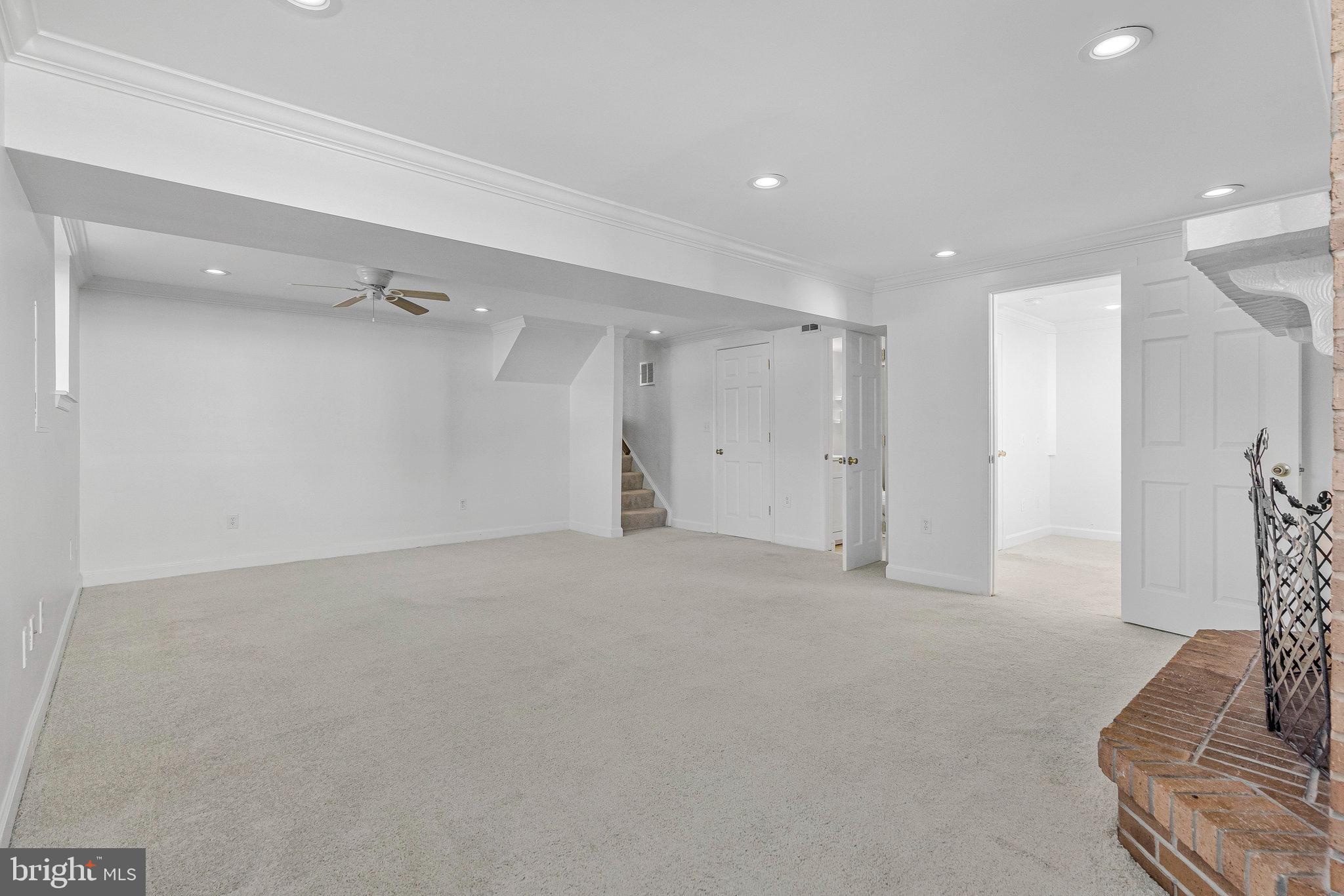 400 East Poplar Road Sterling, VA 20164 - Photo 26 of 40 Lower Level Living Area