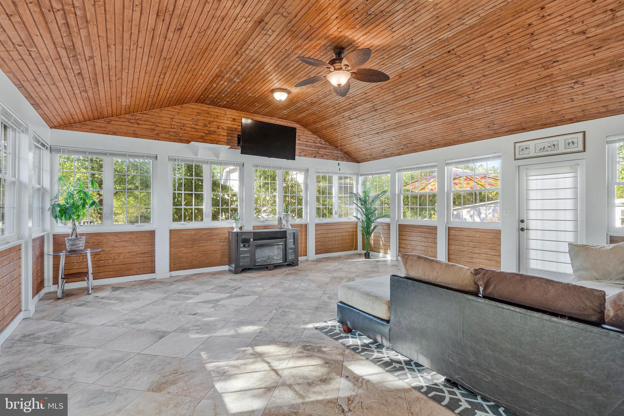 Additional Living Room  with Pine Vaulted Ceiling