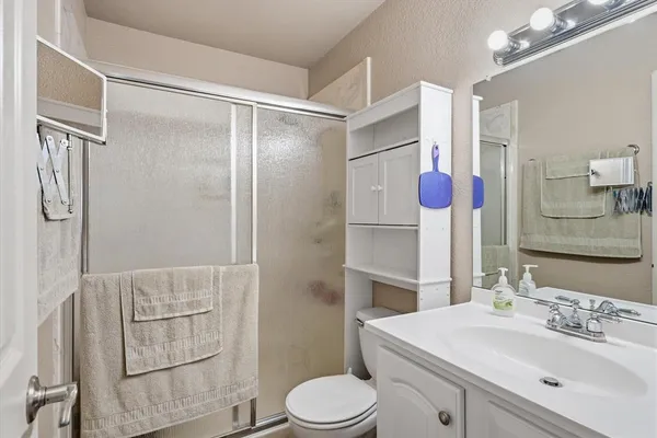 a bathroom with a bathtub and shower