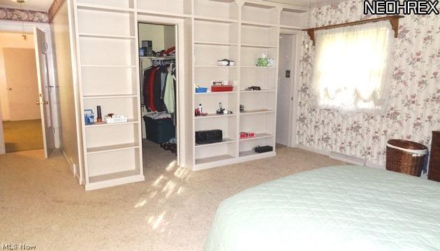 550 Overwood Road Akron, OH 44313 - Photo 12 of 22 Master bedroom with view of Walk In closet and door to Master Bathroom