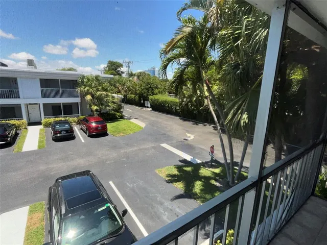a view of a chairs and table on the wooden floor