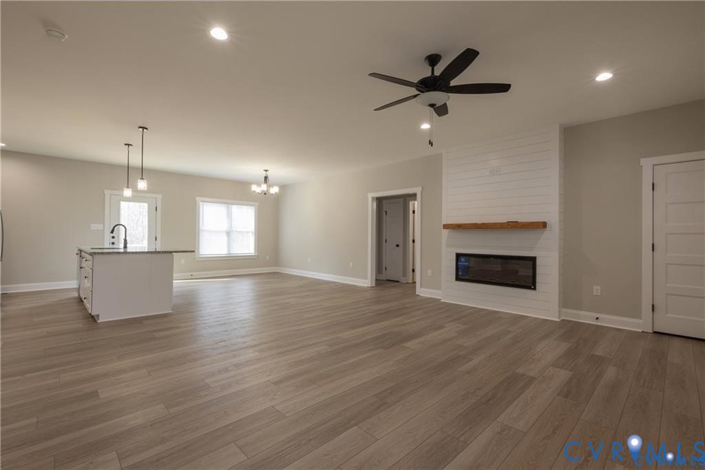 2223 Ridge Road Arvonia, VA 23004 - Photo 9 of 32 Spacious open-concept interior featuring wood-fini