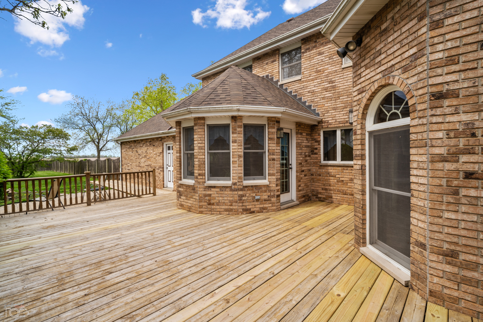 16015 West Baker Road Manhattan, IL 60442 - Photo 11 of 66 a view of a house with wooden deck