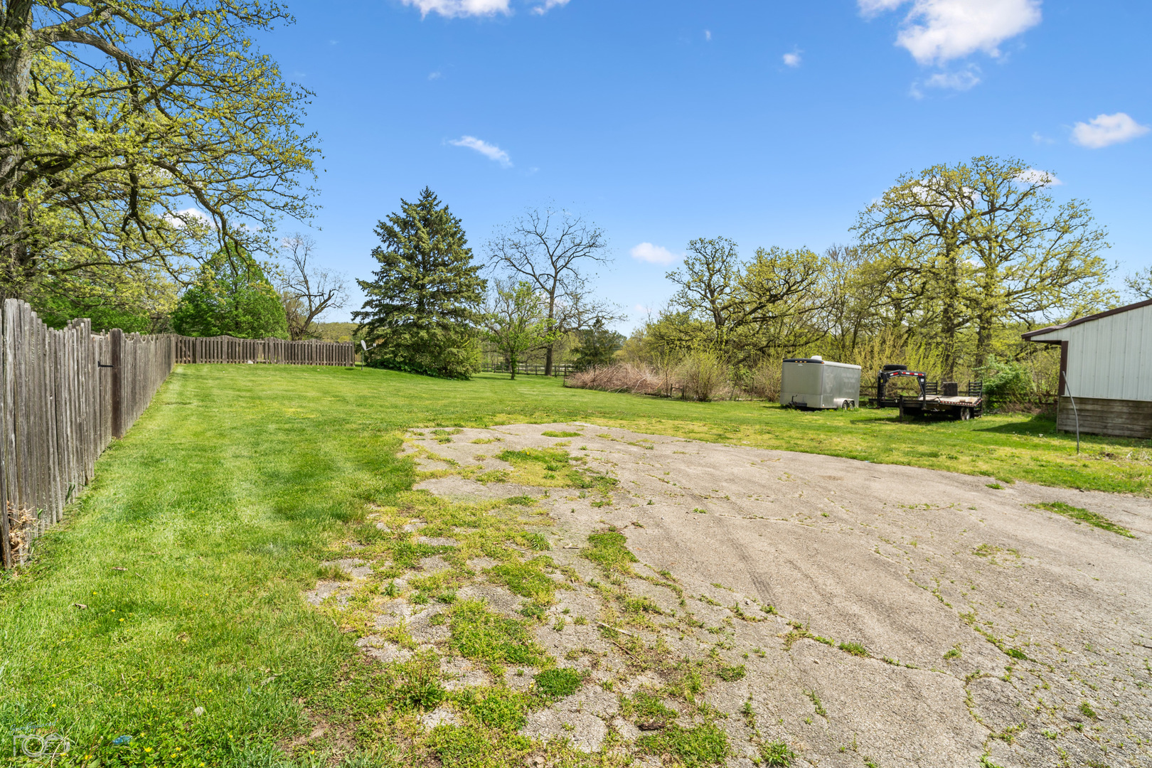 16015 West Baker Road Manhattan, IL 60442 - Photo 13 of 66 a view of a yard with palm trees