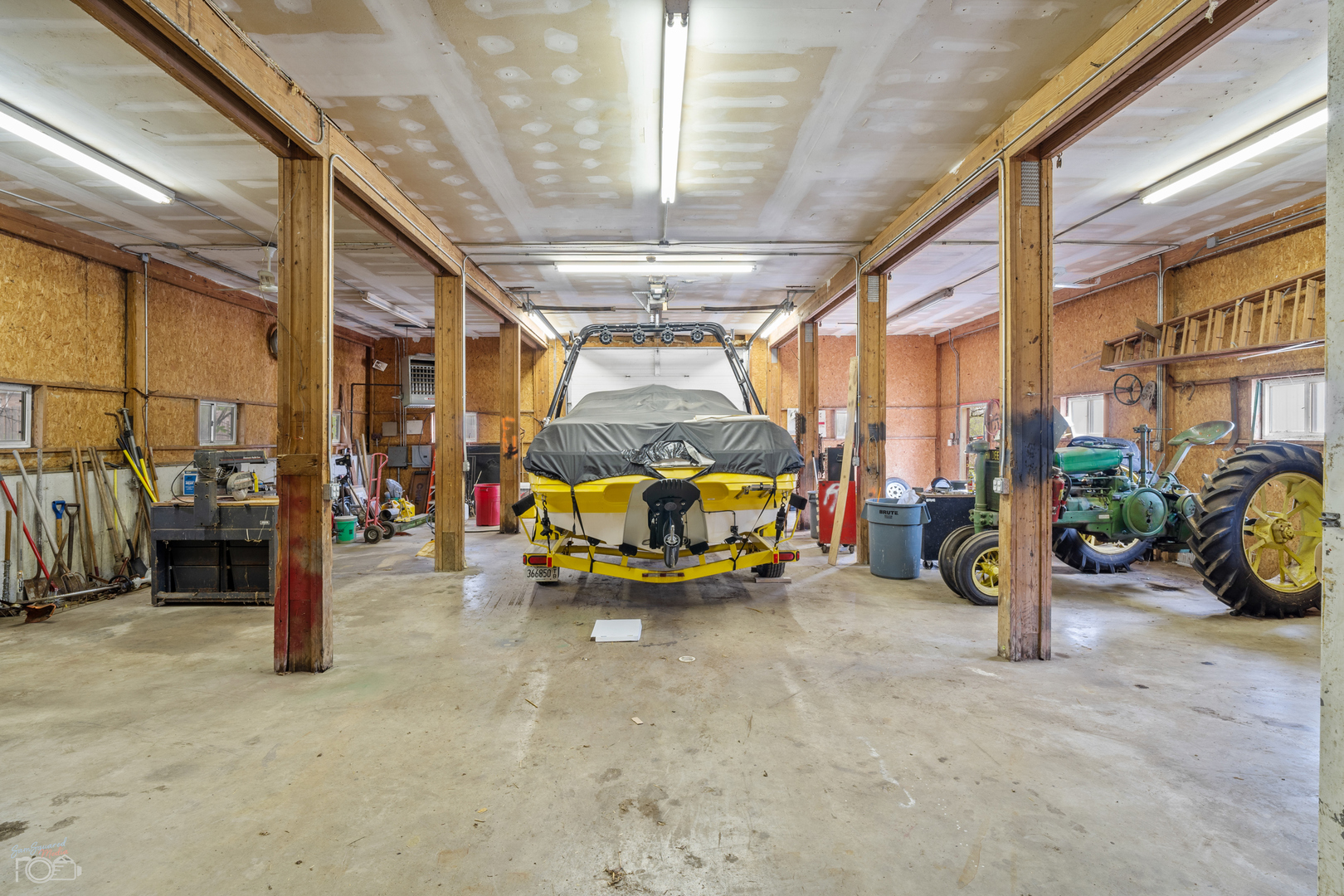16015 West Baker Road Manhattan, IL 60442 - Photo 21 of 66 a view of a garage with cars