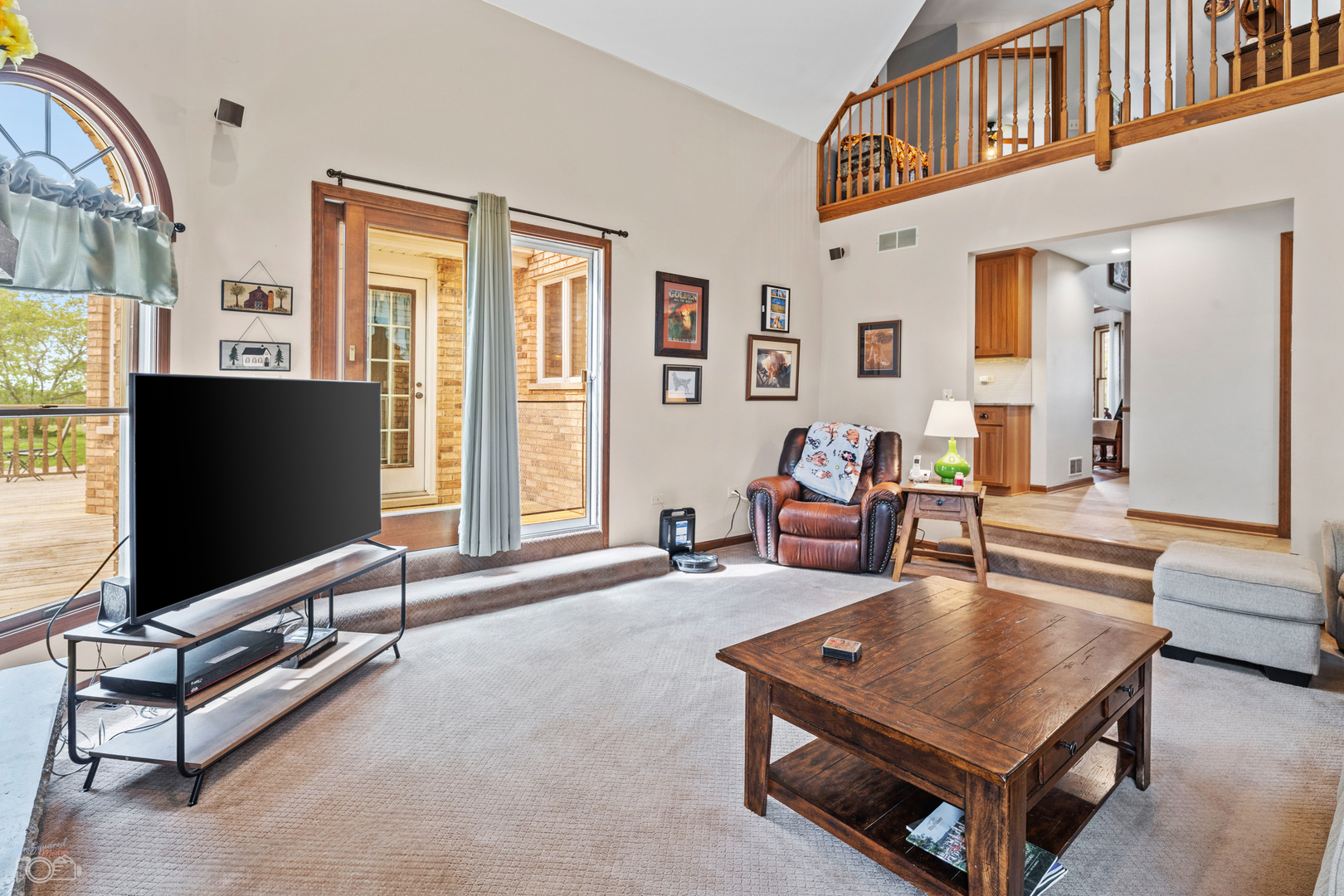 16015 West Baker Road Manhattan, IL 60442 - Photo 30 of 66 a living room with furniture a flat screen tv and a window