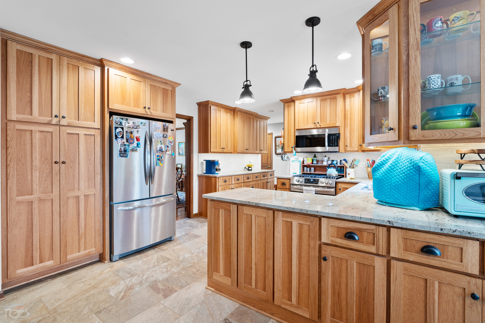 16015 West Baker Road Manhattan, IL 60442 - Photo 35 of 66 a kitchen with stainless steel appliances granite countertop a refrigerator and a sink