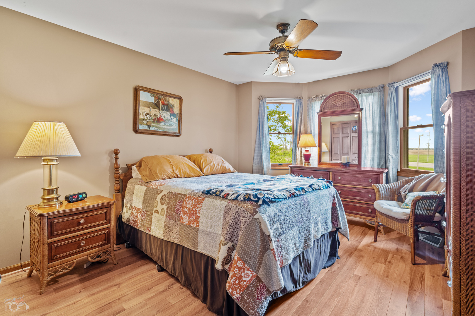 16015 West Baker Road Manhattan, IL 60442 - Photo 50 of 66 a bedroom with a bed and a chandelier