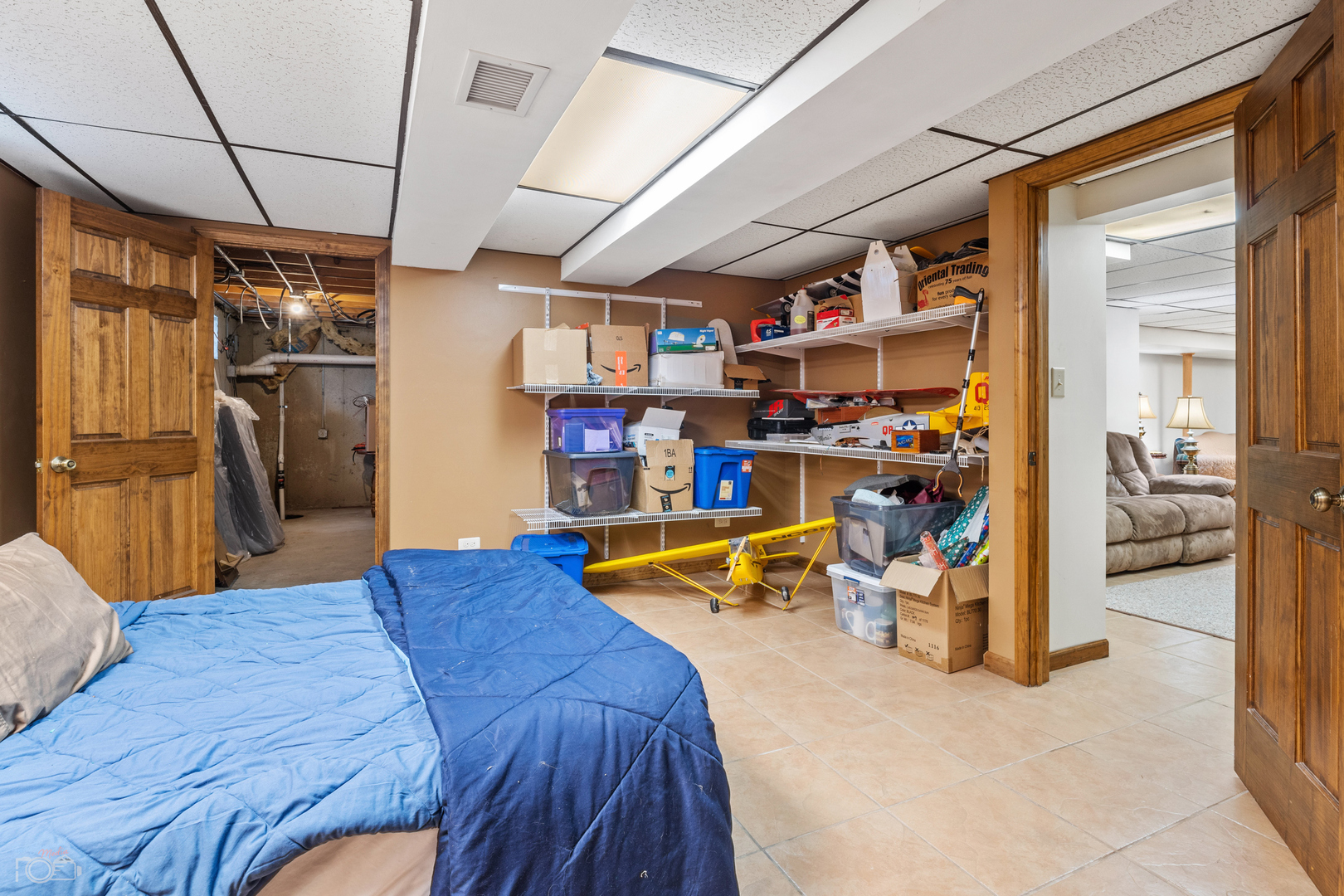 16015 West Baker Road Manhattan, IL 60442 - Photo 57 of 66 a bedroom with a bed and a walk in closet