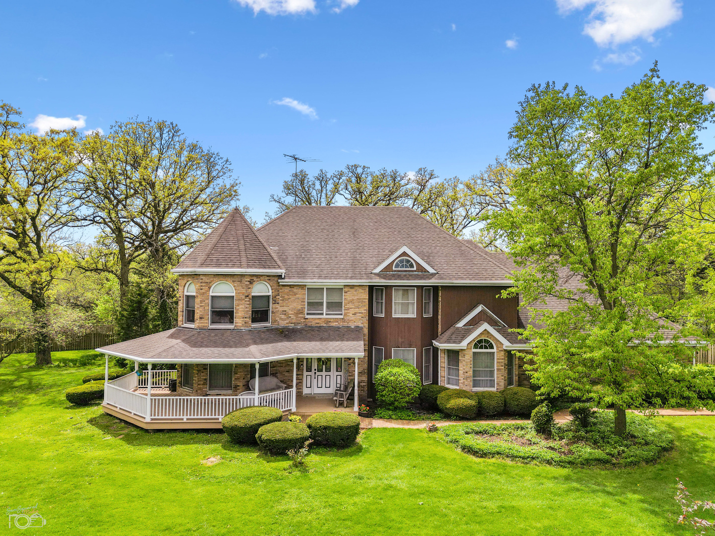 16015 West Baker Road Manhattan, IL 60442 - Photo 58 of 66 a front view of a house with garden